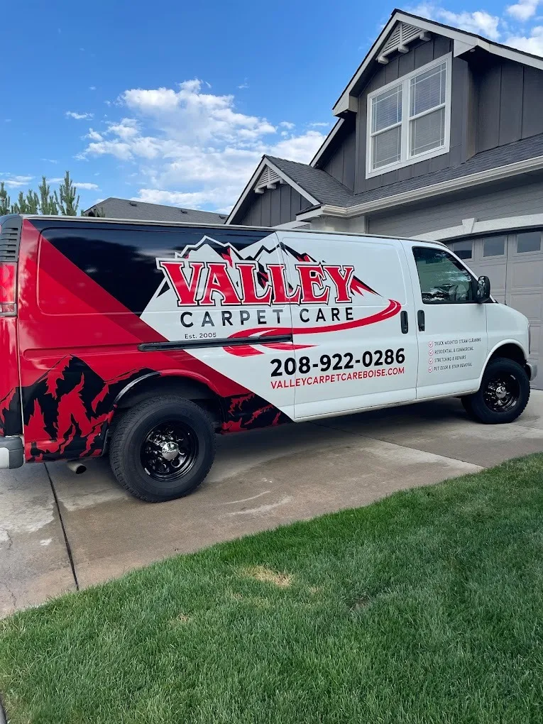 Red and White Carpet Cleaning Van